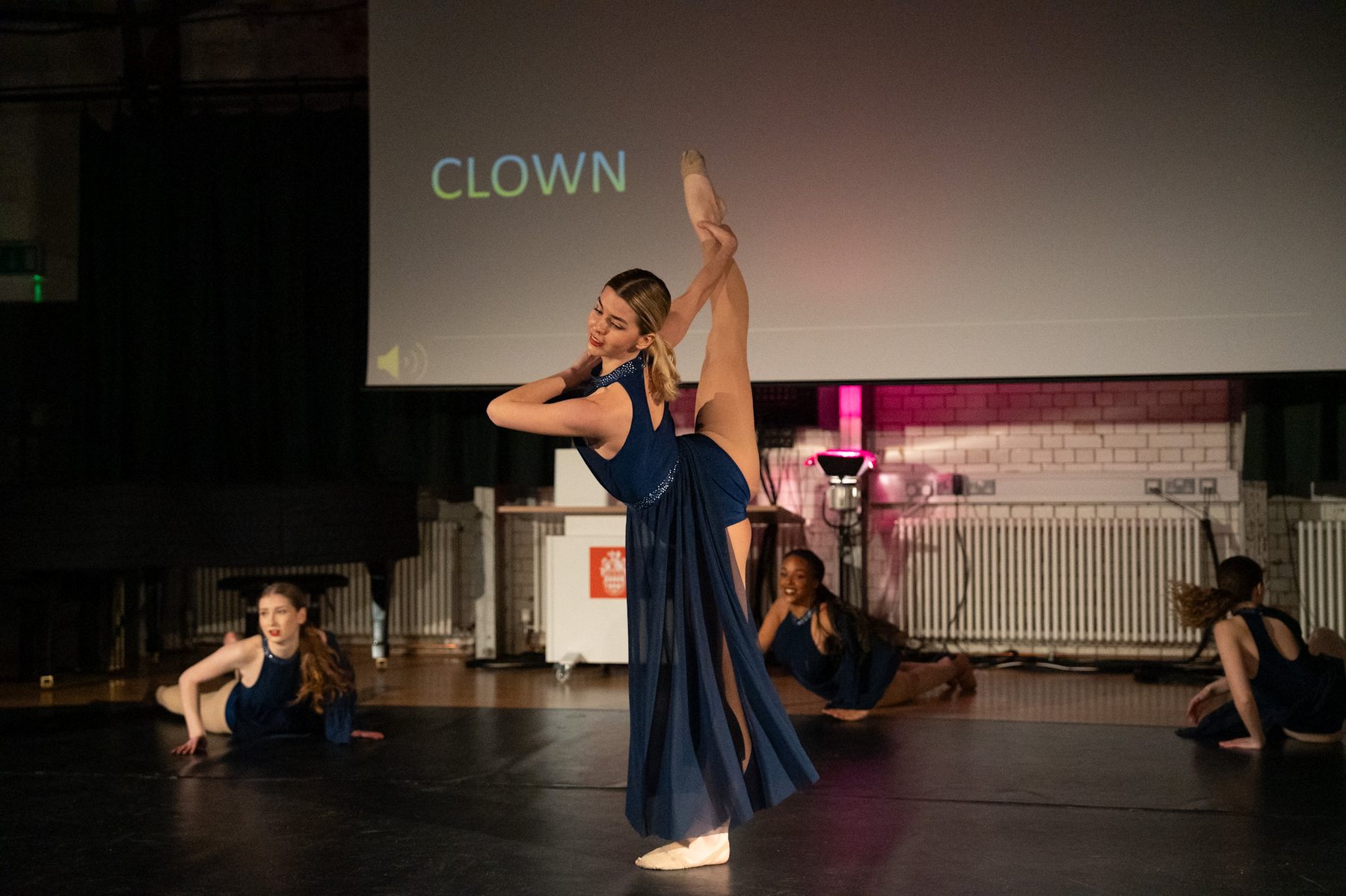 Dancer in an extreme leg extension
