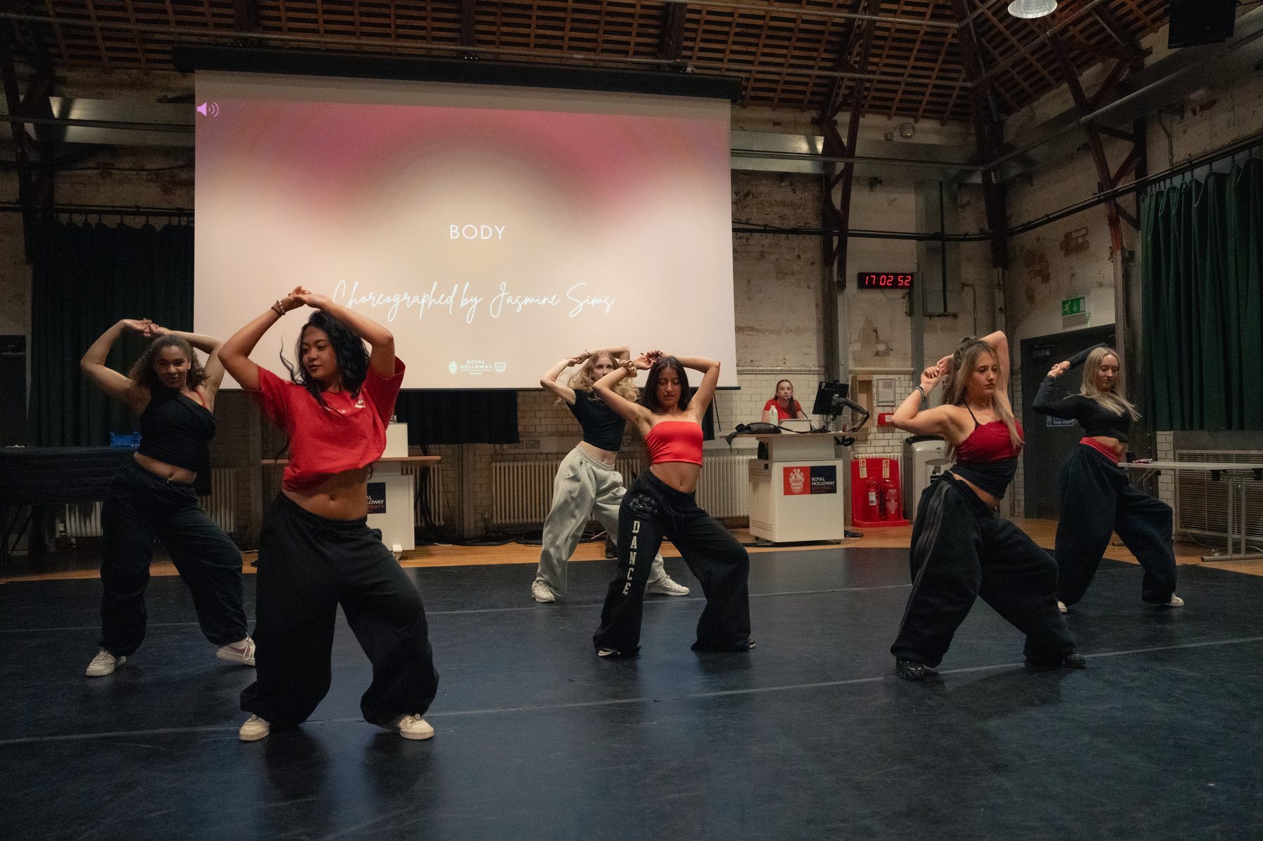 Dance group mid-routine on stage